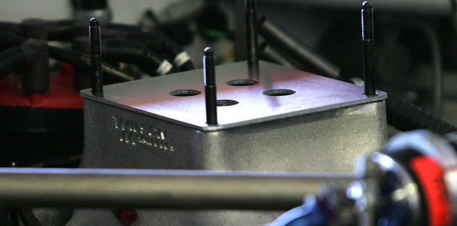 A typical restrictor plate, placed before the intake manifold. Image: Motorsport.com