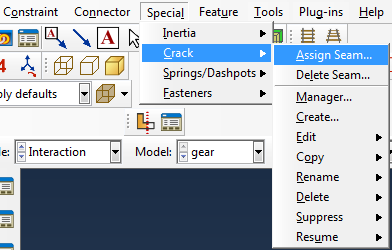 In the interaction module, under special => crack => Assign Seam… a partitioned edge or face can be chosen that will act as seam